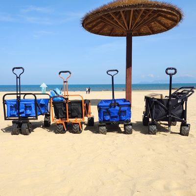 L'ampio vagone di piegatura della ruota accetta il carretto piegante a quattro vie su misura della spiaggia