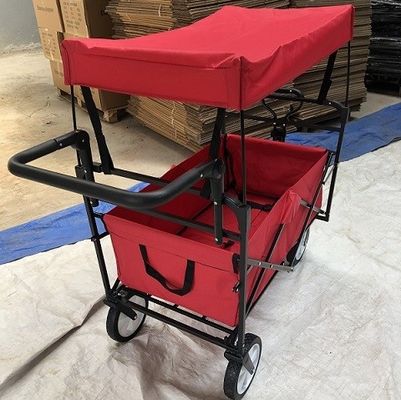 I carretti pieghevoli del carretto pieghevole rosso del vagone con le ruote coprono la maniglia di spinta